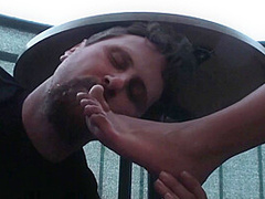 Sexy femdom smoking a cigarette while getting feet licked and toes sucked by Foot Girls