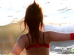 Hot babes on the beach teasing the camera