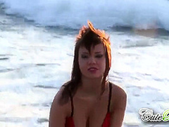 Hot babes on the beach teasing the camera