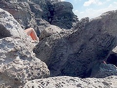 Gorgeous Readhed Fucked On The Beach Between The Rocks