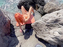 Gorgeous Readhed Fucked On The Beach Between The Rocks