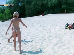 Nudist Teens With Slim Body Is Enjoying The Sun On The Rocky Beach