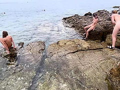 Spending The Day On A Nude Beach Island While On Vacation Sunbathing And Swimming