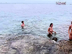 Spending The Day On A Nude Beach Island While On Vacation Sunbathing And Swimming