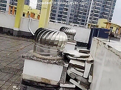 Girl Tied Up Walking On The Rooftop