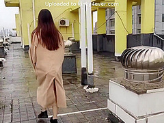 Girl Tied Up Walking On The Rooftop