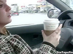 Public slut sucks cock in the car while stopped