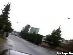 Public slut sucks cock in the car while stopped