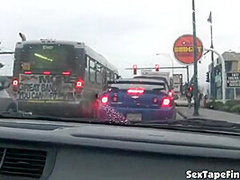 Public slut sucks cock in the car while stopped