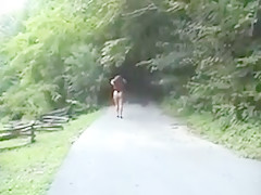 Look Mom is walking in the garden.