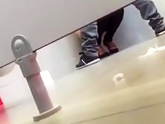 Couple in the public toilet