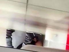 Couple in the public toilet