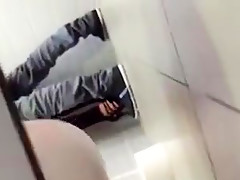Couple in the public toilet