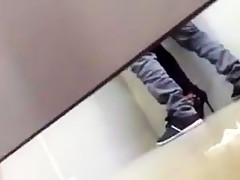 Couple in the public toilet