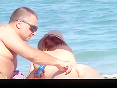 Beautiful nude girl on the beach