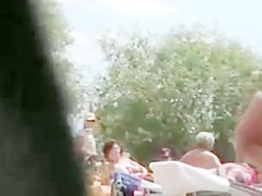 Matures suntanning naked