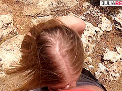 Girl sucks a huge cock then rides it under the rocks to a cumshot