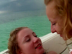 Two hot babes have amazing lesbian sex on the boat on the sea
