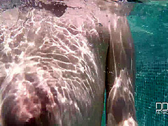 Natural Tits Superstar Teases With Cleavage in Pool - PornWorld