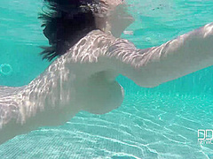 Natural Tits Superstar Teases With Cleavage in Pool - PornWorld