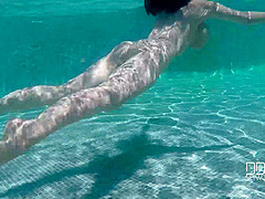 Natural Tits Superstar Teases With Cleavage in Pool - PornWorld