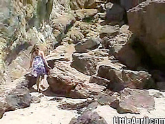 Hot teen fingers herself in outdoor scene