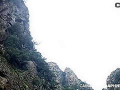 Daphne sucks and fucks a dick at outdoor waterfall