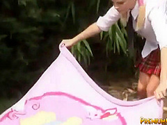 Young Kimmy masturbates in naughty outdoor scene