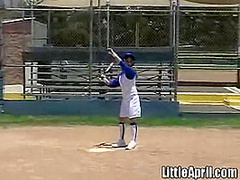Little April rubbing her pussy at baseball field