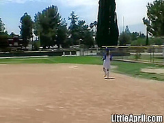 Little April rubbing her pussy at baseball field