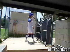 Little April rubbing her pussy at baseball field